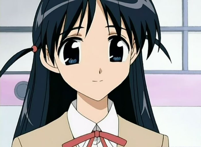 Cute animated character with long black hair and a beige school uniform, smiling sweetly indoors.