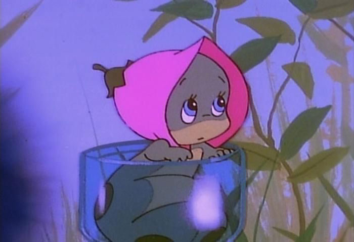 Cute animated character with big eyes, wearing a pink flower bonnet, sitting in a glass jar surrounded by leaves.