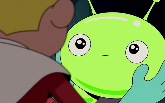 Cute animated character with big eyes, lime green skin, and antennae, looking surprised.