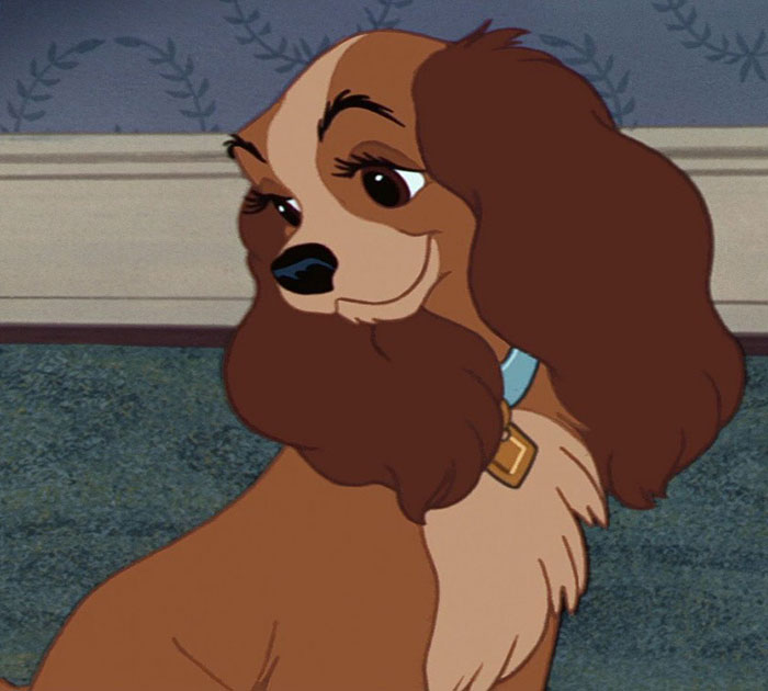 Cute animated character, brown dog with long ears and a collar, sitting indoors with a sweet expression.