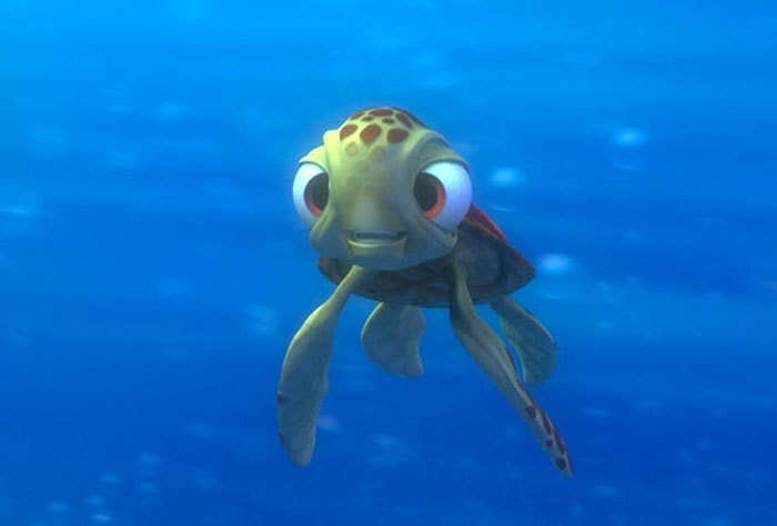 Cute animated character turtle swimming underwater with a happy expression.