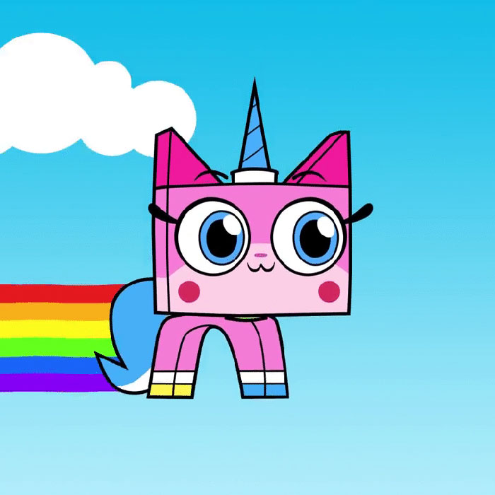 Cute animated character with a pink square body, unicorn horn, and rainbow tail against a blue sky.