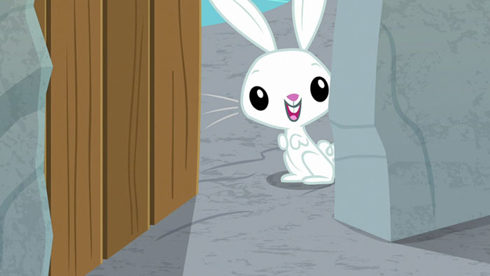Cute animated bunny peeking from behind a wooden door, with big eyes and a happy expression.