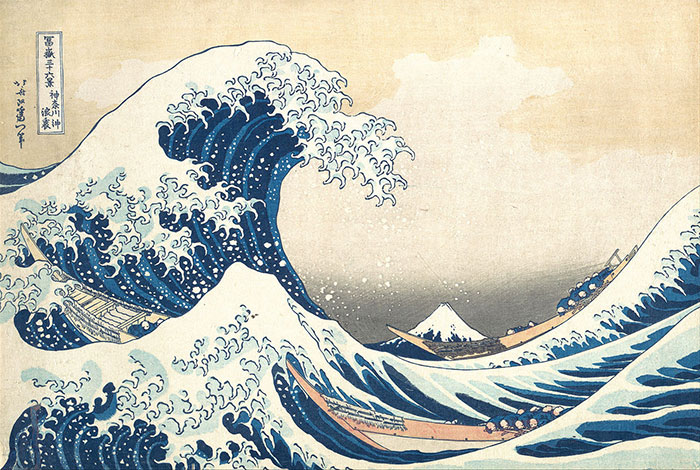 Famous painting of a large wave with Mount Fuji in the background, depicting traditional Japanese art style.