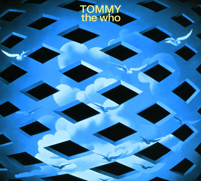 Album cover of "Tommy" by The Who, featuring a surreal blue sky with clouds and birds.