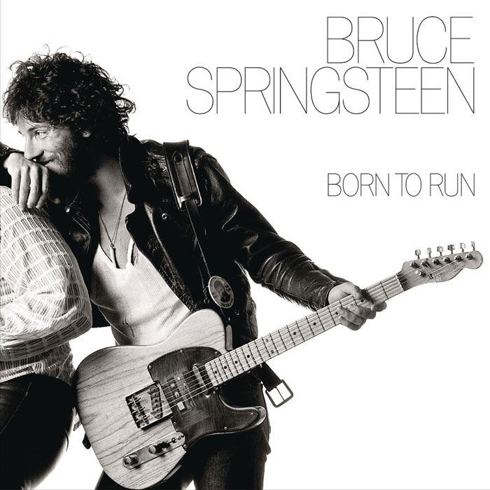 Album cover of "Born to Run" featuring a musician with a guitar.