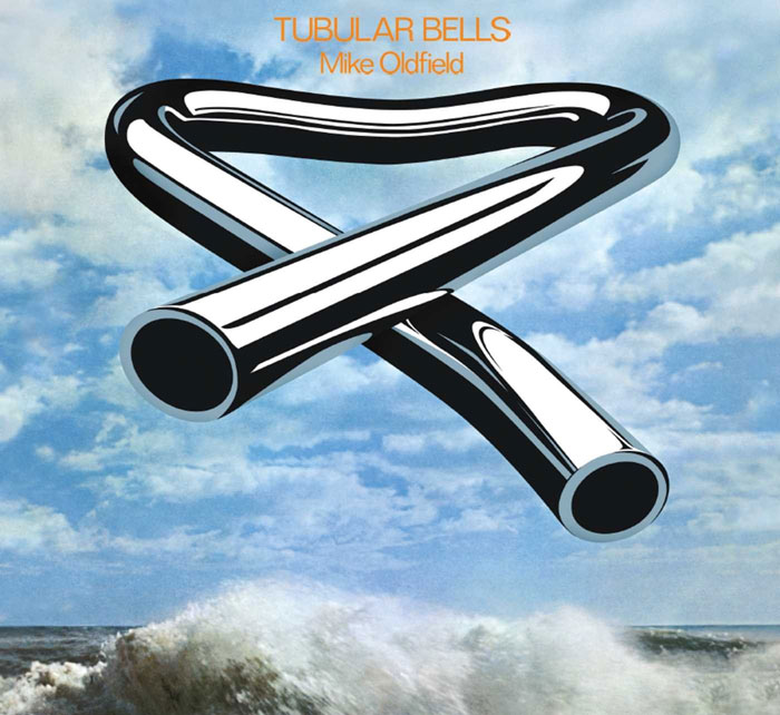Iconic album cover for "Tubular Bells" by Mike Oldfield featuring bent metallic tubes over a stormy sea background.