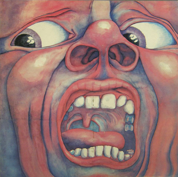 Abstract face artwork from one of the greatest album covers, featuring a distorted screaming expression.