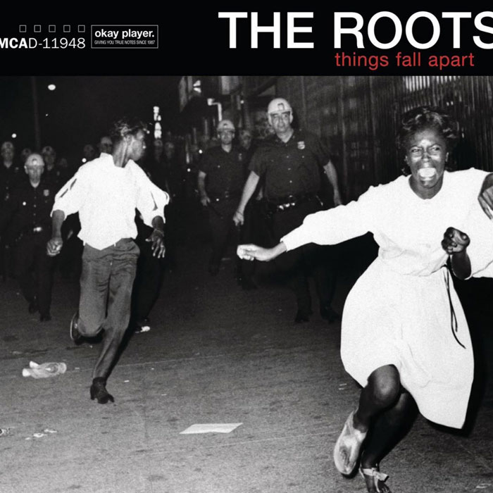 Album cover of "Things Fall Apart" by The Roots, showing a historic black and white scene with people running.