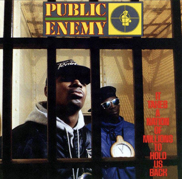 Public Enemy album cover featuring two men behind bars with bold typography.
