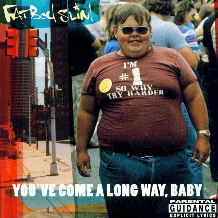 Overweight man in sunglasses wearing a humorous t-shirt, iconic album cover design.