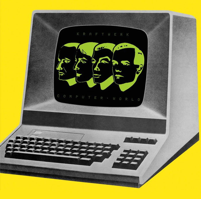 Retro album cover featuring a vintage computer display with stylized faces and text, representing one of the greatest album covers.