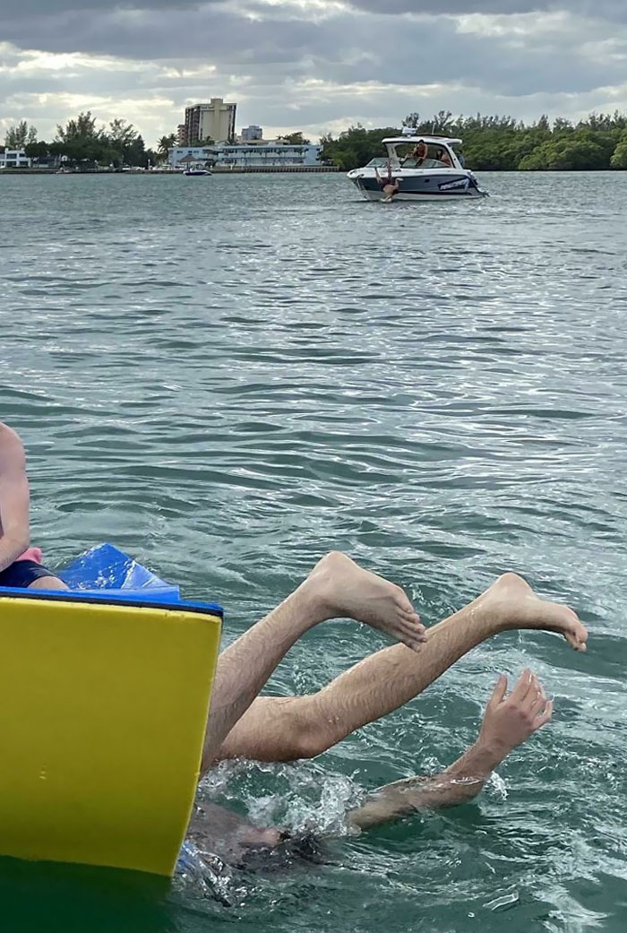 I Got A Pic Of My BF Falling Off A Floaty And Just Realized There Was A Guy Falling Off A Boat At The Same Time