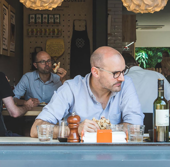 Same Guy Enjoying Two Meals At One Restaurant