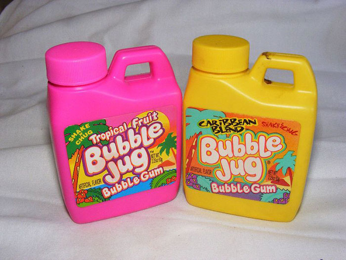 90s nostalgic Bubble Jug bubble gum containers, pink and yellow, on a white background.