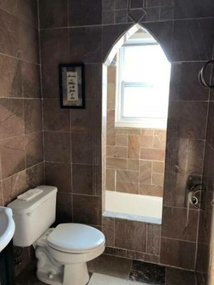 When The Rest Of The Apartment Is Basic And Overpriced, But You Get A Portal To Your Bathtub