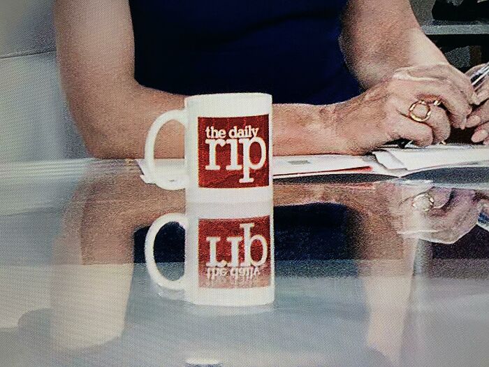 In ‘Don’t Look Up’ (2021), Astronomers Appear On A ‘Morning Joe’-Style Cable News Talk Show. Though Not Explicitly Noted As Liberal, Their Logo Reflects Their Slant. A Clever Detail!