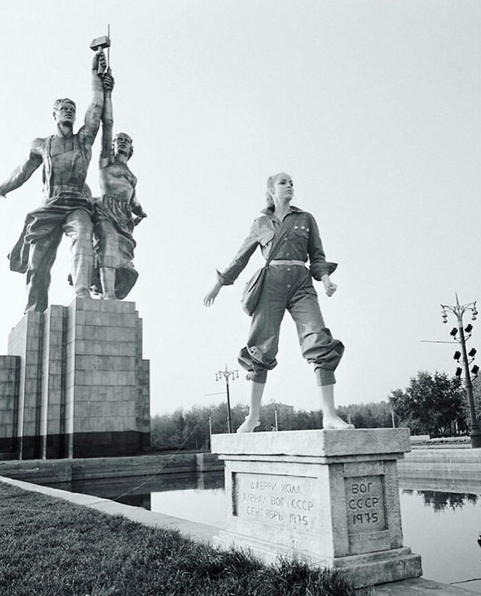 American Model Jerry Hall Posing Next To Worker And Kolkhoz Woman Monument At The Exhibition Of Achievements Of National Economy In Moscow. Photo By By Norman Parkinson, USSR, 1975