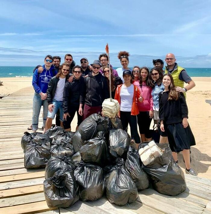 People Cleaning The Ocean. Team Seas