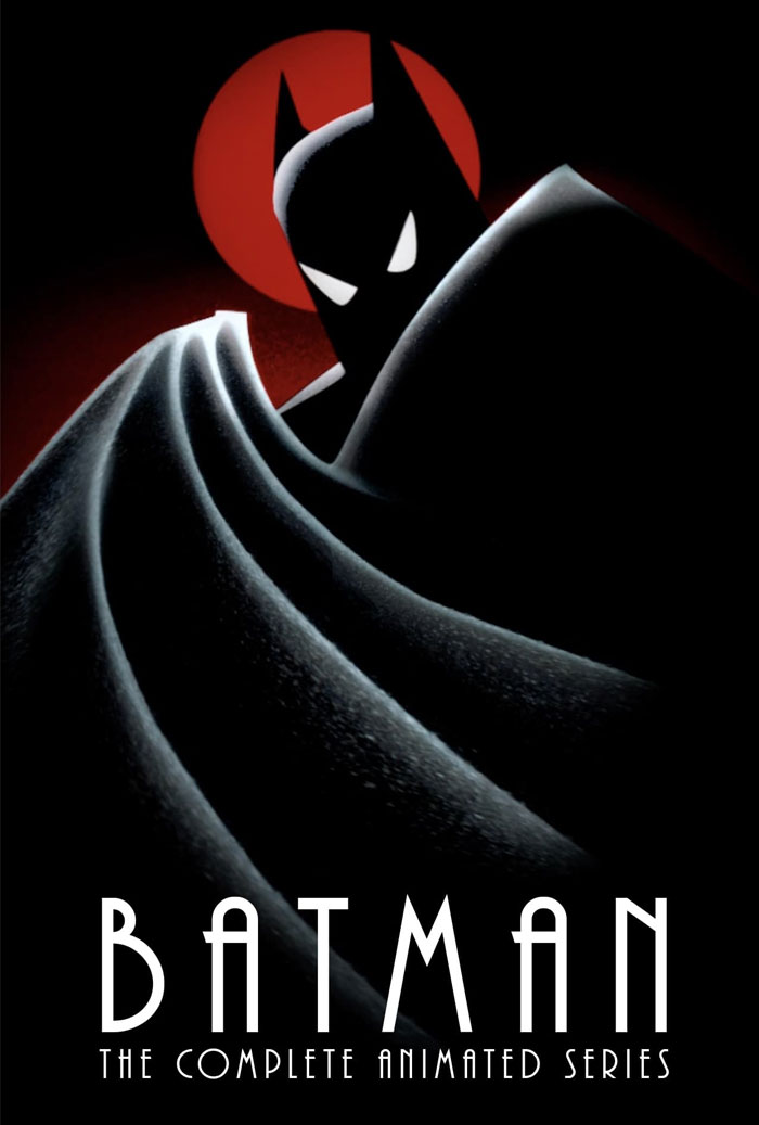 Batman from iconic '90s cartoons, silhouetted against a red background with cape draped dramatically.