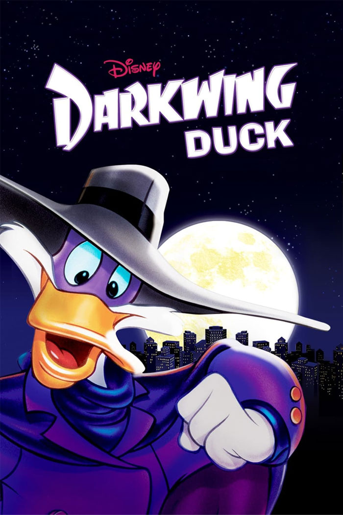 Darkwing Duck, a popular '90s cartoon character, posing dramatically in front of a city skyline and full moon.