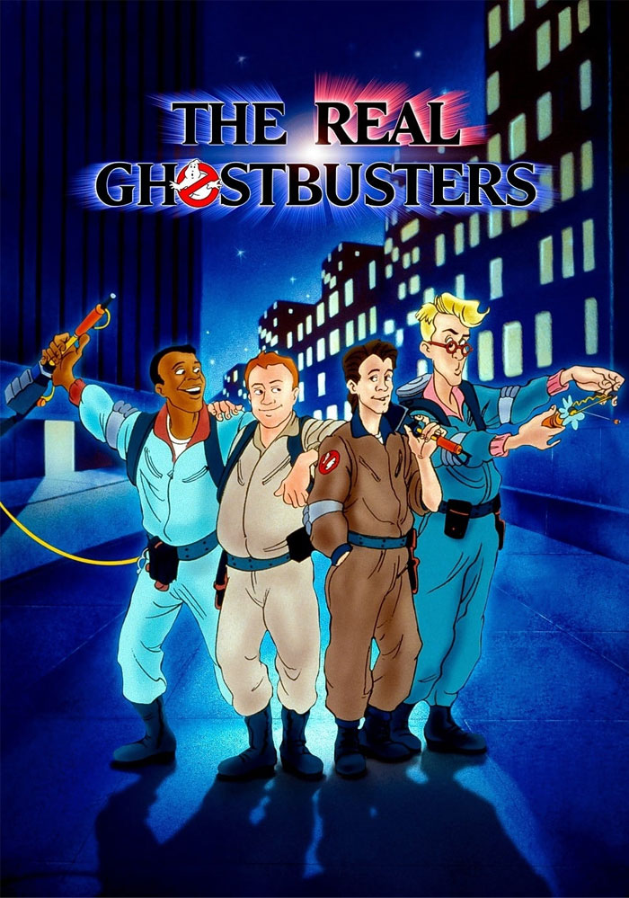 '90s cartoons, The Real Ghostbusters characters standing together in uniform with city buildings in the background.