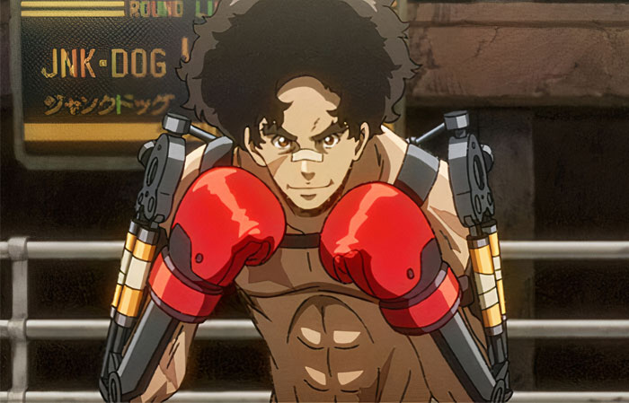 Joe wearing boxing gloves