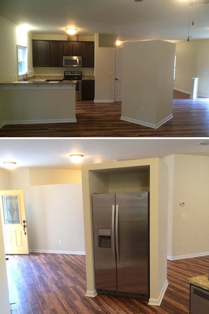 Awful home interior design with misplaced fridge wall blocking the kitchen view.
