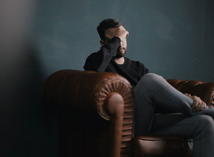 Therapist Explains How Capitalism Affects Your Mental Health