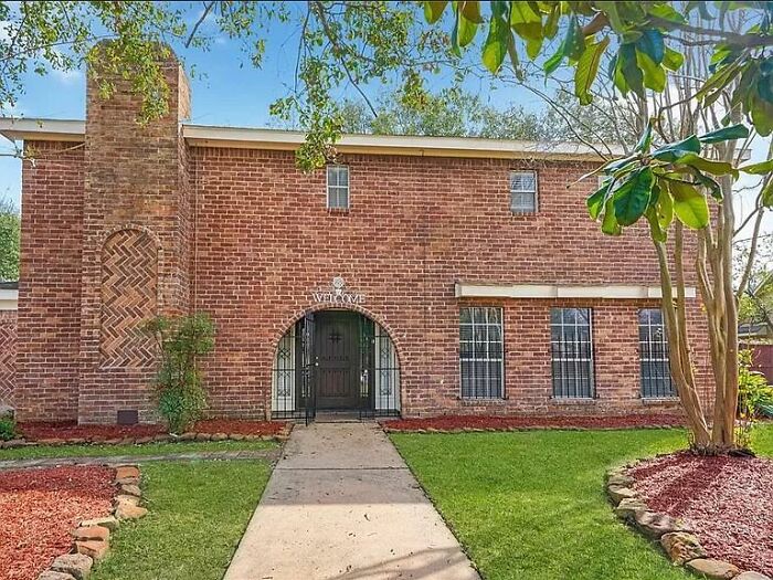I Adore The Juxtaposition Of The Welcome Sign And The Barred Windows And Door