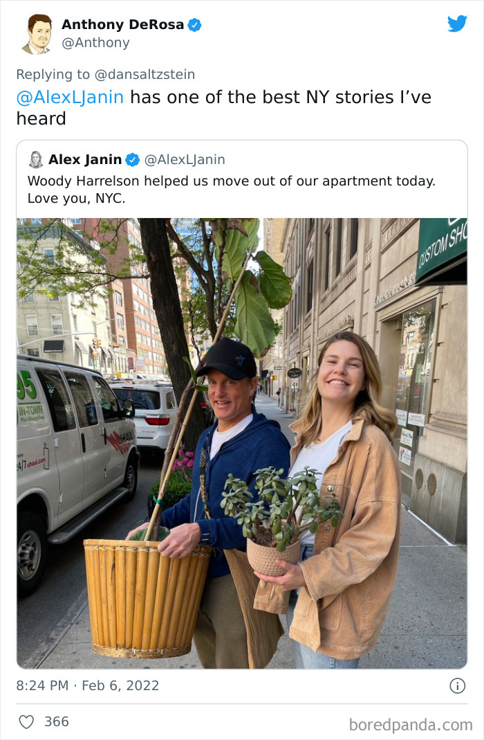 Two New Yorkers smiling on a city sidewalk carrying plants, sharing wholesome and weird NYC experiences.