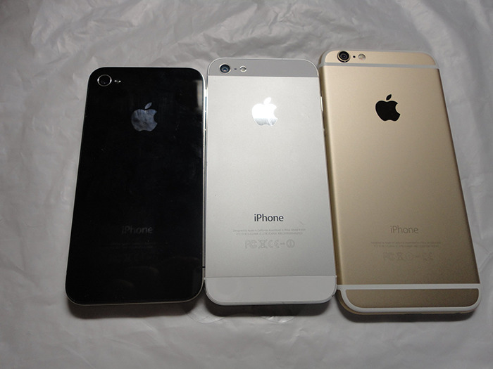 Three different models of iPhones in black, silver, and gold, highlighting technology and conspiracies proven real online.
