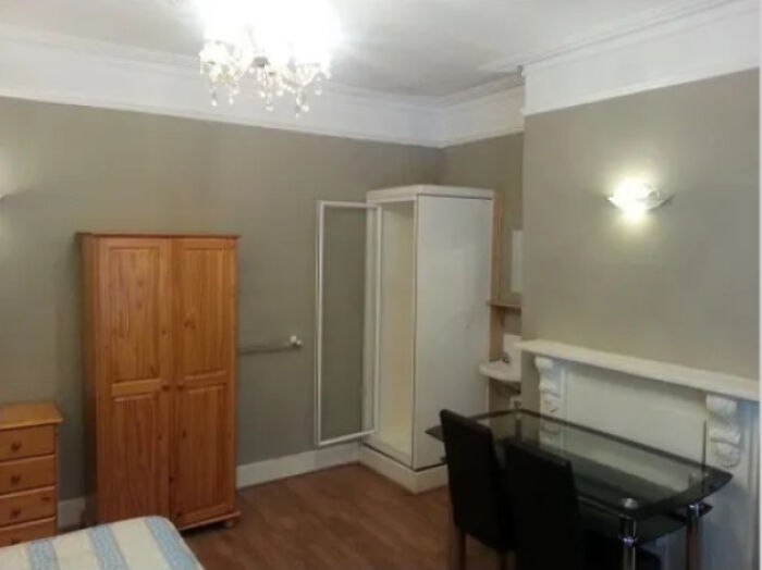 Looking For A Place To Live In London. Found One For £650 Per Month, No Bills Included. This 'Studio Flat' Has A Shower In The Living Room, If You Look Real Close, You'll See The Sink Beside It Too (Chefs Kiss)