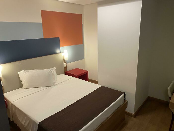 Hotel Room Has A Massive Pillar Blocking The Other Side Of The Bed, Also Makes For A Very Cozy Depression Corner