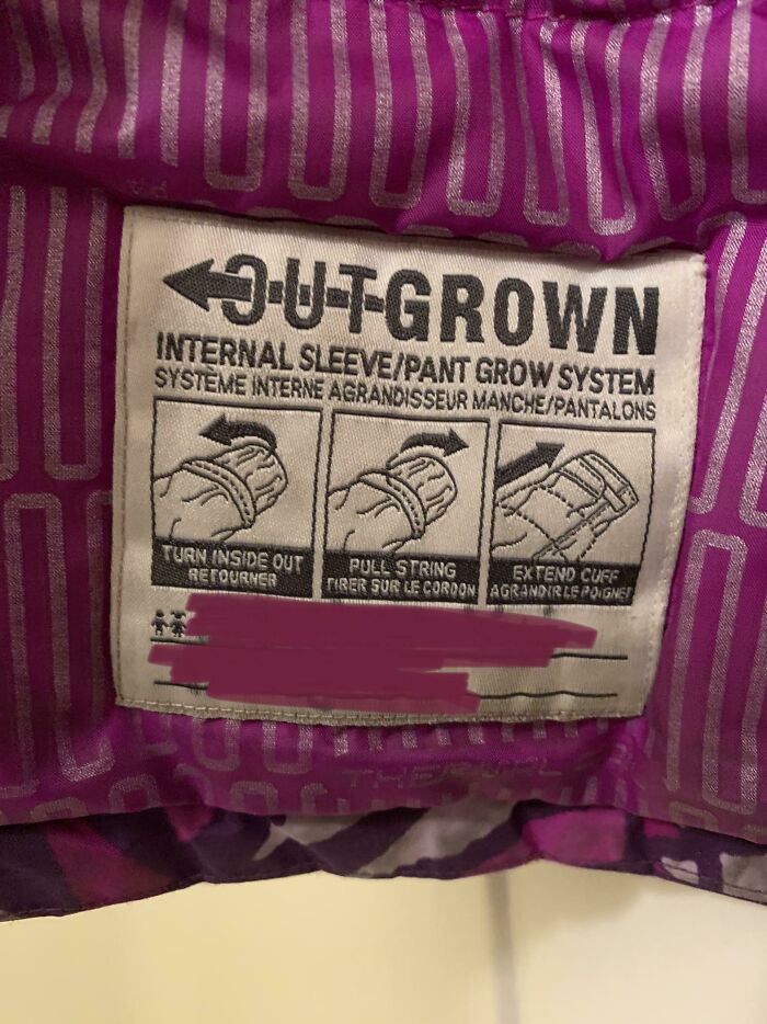 My Daughter’s Raincoat Has A Built-In System For When She Outgrows It