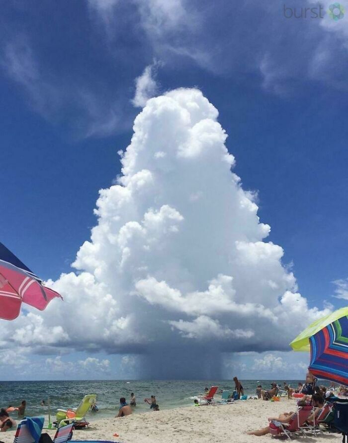Rain Cloud Near The Beach