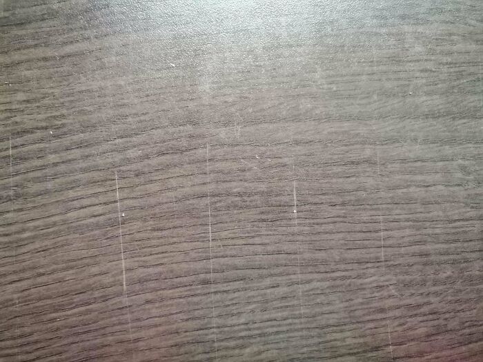 My Brother's Girlfriend Moved In With Us, And She Refuses To Use Cutting Boards. This Is What Our Kitchen Table Looks Like Now. They're All Over It