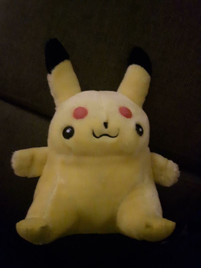 Plush toy resembling a distorted Pikachu with an unsettling face, one of the hilariously creepy toys causing nightmares.