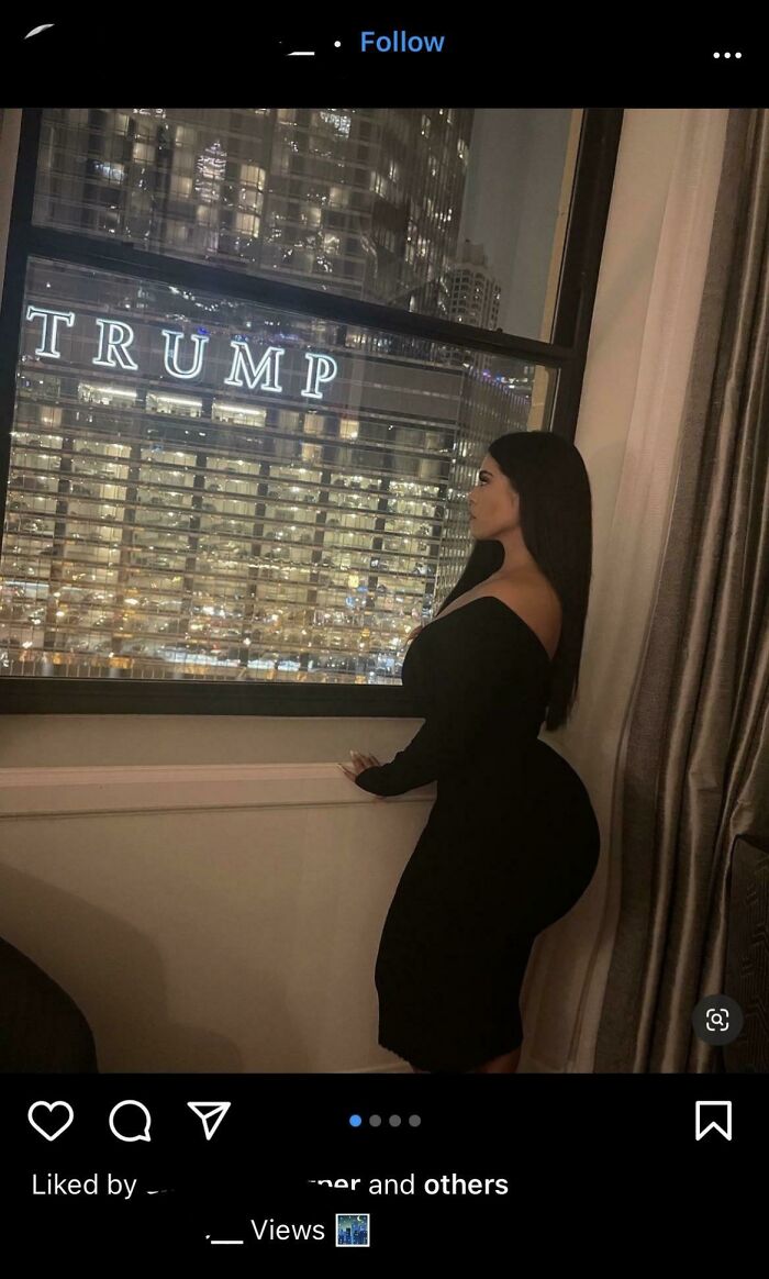 Check Out The Curtains Behind Her