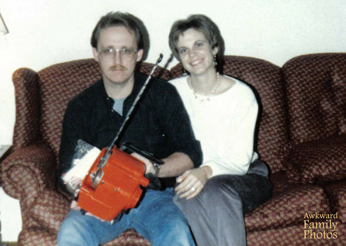 A couple sitting on a sofa, the man holding a chainsaw, featuring funny couples' picture from Instagram.