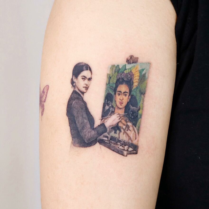 Tattoo of a woman painting a self-portrait, showcasing detailed painting-like artistry.