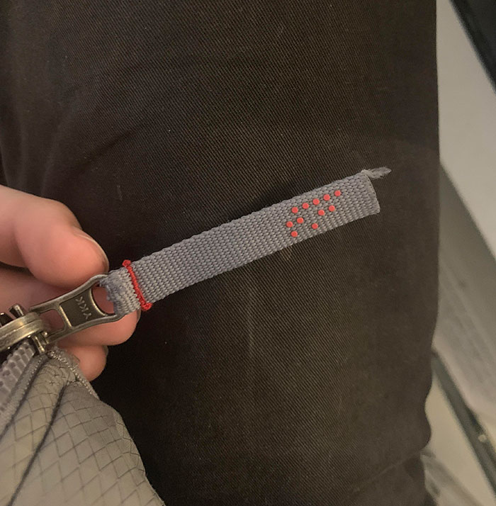 My The North Face Jacket Spells Out The Initials “TNF” In Braille On The Zipper