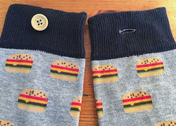 My New Socks Have A Button To Keep Them Together In The Closet Or When Drying