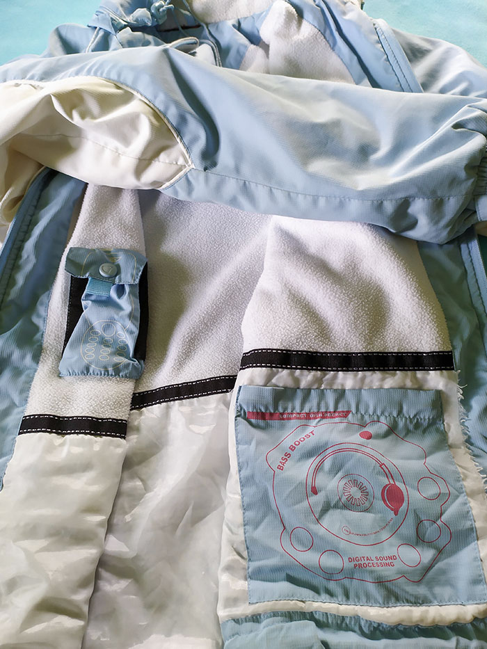 My Mom's Jacket Is So Old, It Has Specific Pockets For A CD Player And A Button Mobile Phone