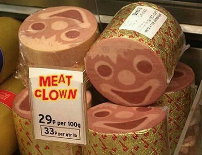 Cursed food in the shape of a clown face, labeled "Meat Clown," displayed in a supermarket.
