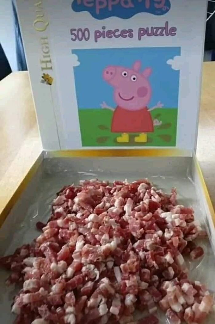 Cursed food puzzle with bacon bits resembling a toy set in a Peppa Pig box.