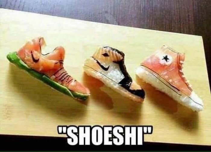 Cursed foods: sushi shaped like colorful sneakers displayed on a wooden board.