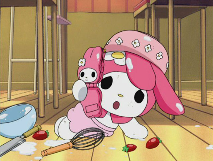 Cute animated character My Melody wearing a pink bonnet, sitting on the floor with kitchen utensils and strawberries around.