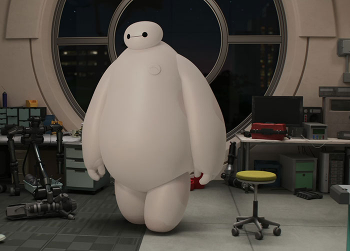 Cute animated character in a lab with a large circular window and robot parts around.