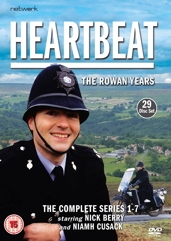 "Heartbeat DVD cover featuring police officer in uniform, background landscape."